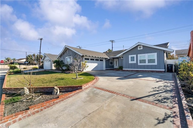 single story home featuring a front yard, concrete driveway, fence, board and batten siding, and a garage
