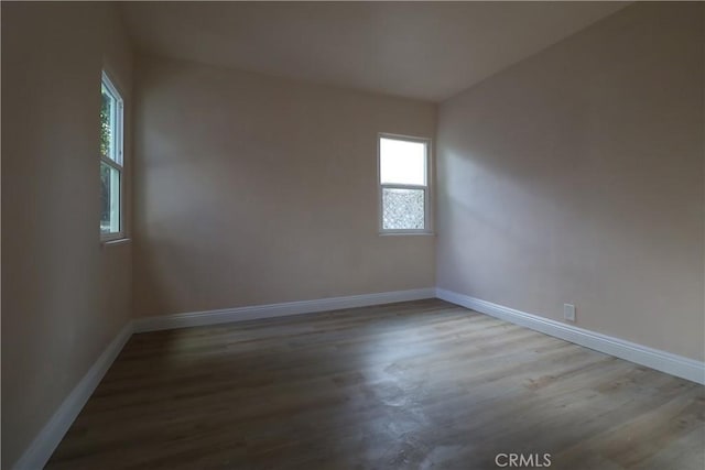 unfurnished room featuring light wood-type flooring