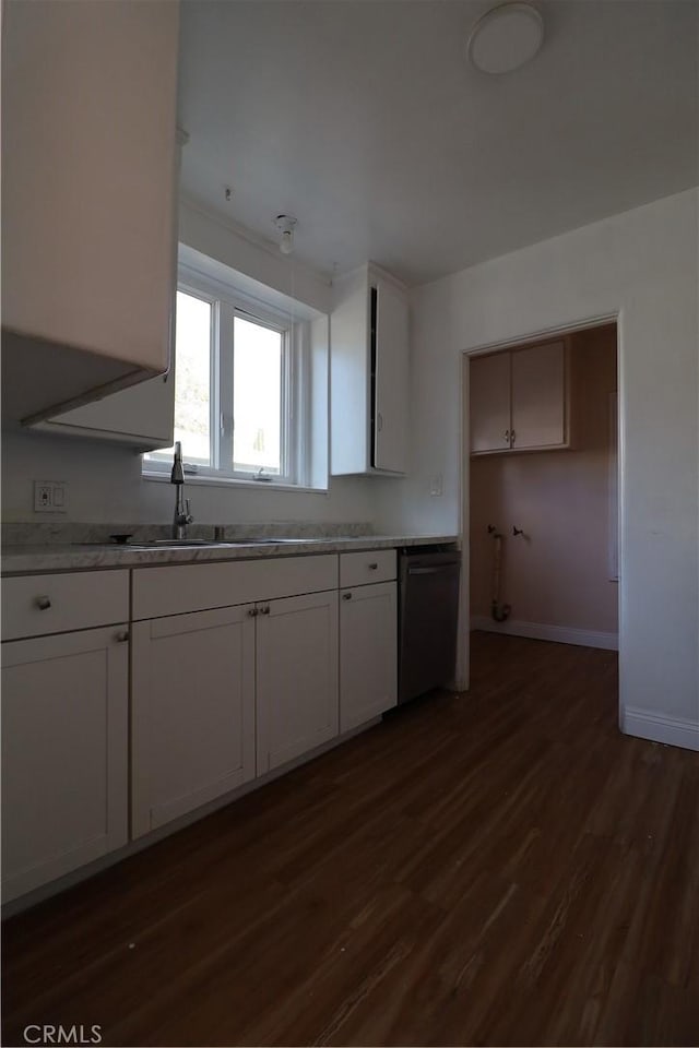 kitchen with sink, white cabinets, dishwasher, and dark hardwood / wood-style flooring