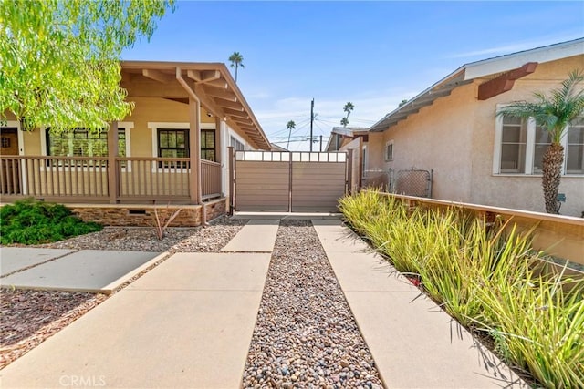 view of home's exterior with covered porch