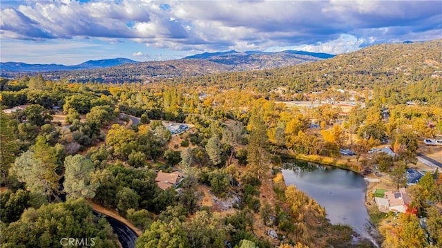 aerial view with a water and mountain view