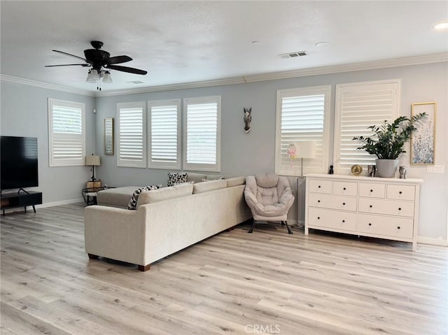 living room with ceiling fan, light hardwood / wood-style flooring, and ornamental molding