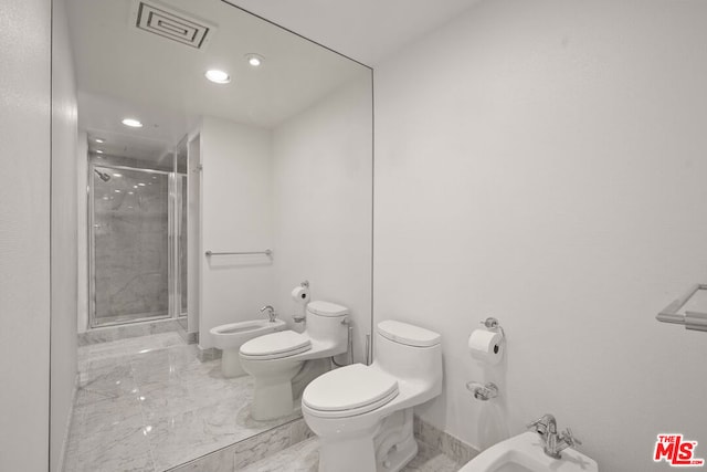 bathroom featuring toilet, a shower with door, and a bidet