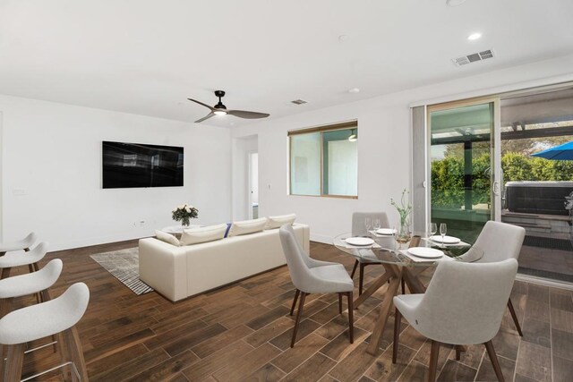 dining space with ceiling fan