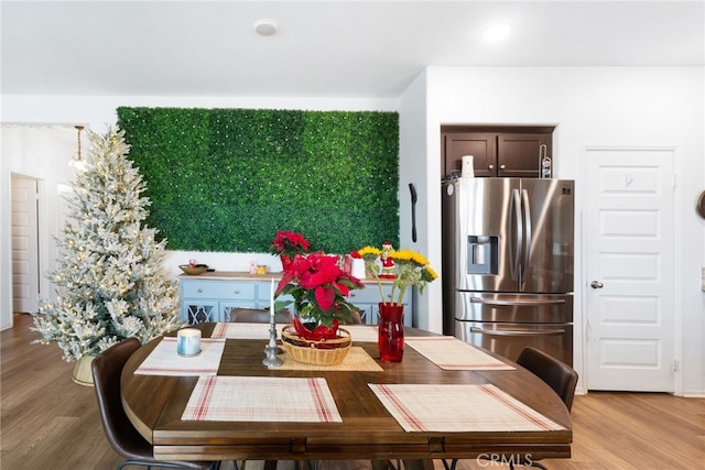 dining room featuring light hardwood / wood-style floors