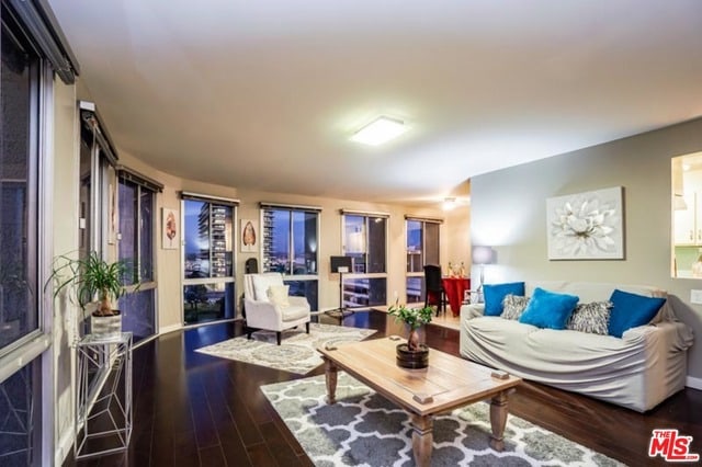 living room with dark hardwood / wood-style floors