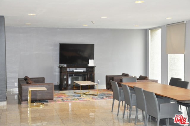 dining space featuring a fireplace