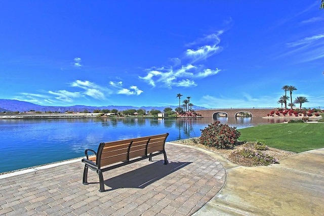 view of property's community with a water and mountain view