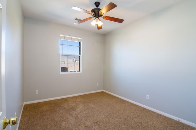 carpeted empty room with ceiling fan