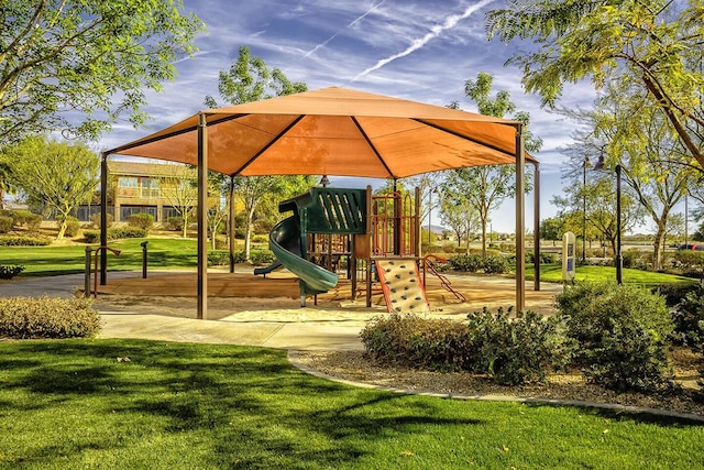 view of jungle gym with a lawn