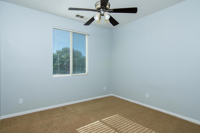 carpeted empty room with ceiling fan