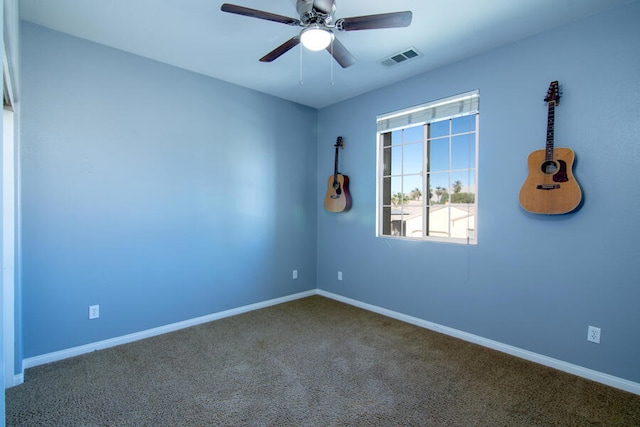 unfurnished room featuring carpet and ceiling fan