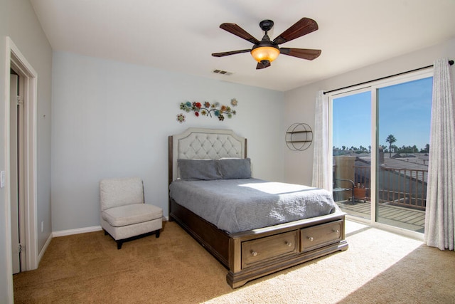 carpeted bedroom with access to outside and ceiling fan