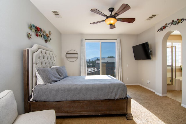 bedroom featuring carpet, connected bathroom, and ceiling fan