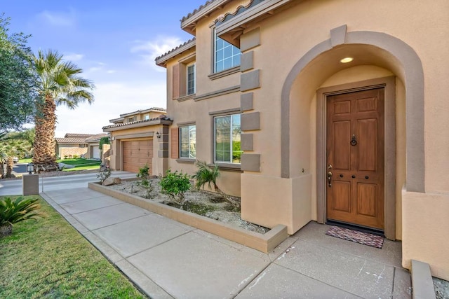 property entrance featuring a garage