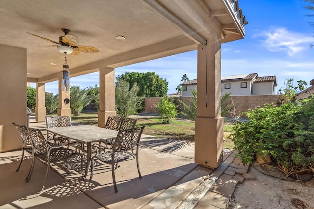 view of patio featuring ceiling fan