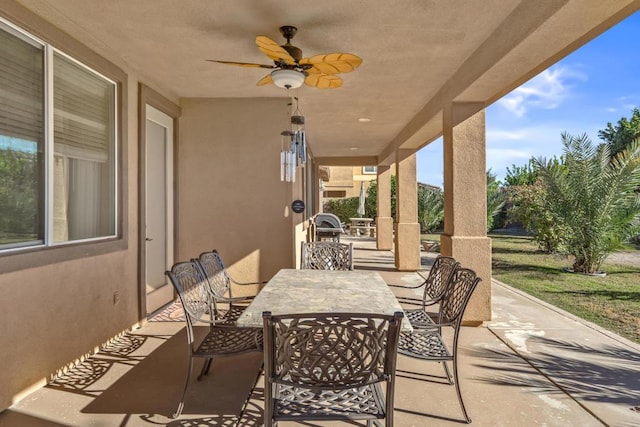 view of patio featuring ceiling fan