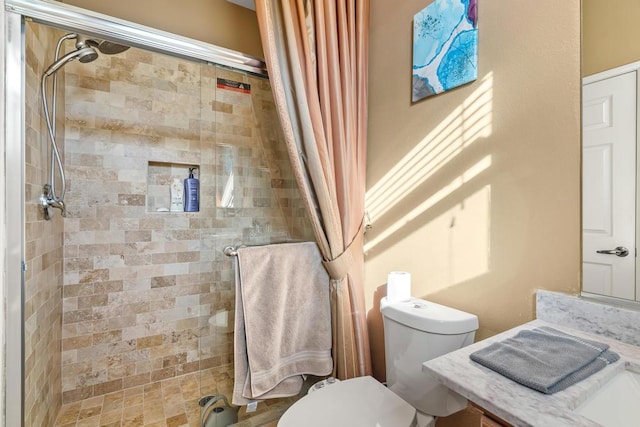 bathroom with toilet and curtained shower