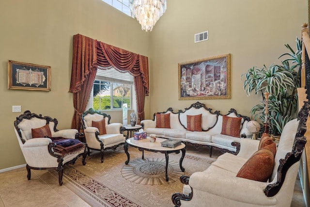 tiled living room with a chandelier and a towering ceiling