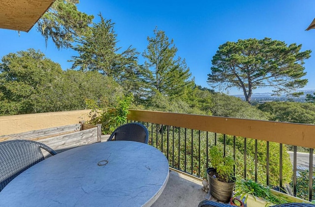 view of patio / terrace with a balcony