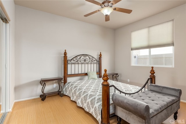 bedroom featuring ceiling fan and wood-type flooring