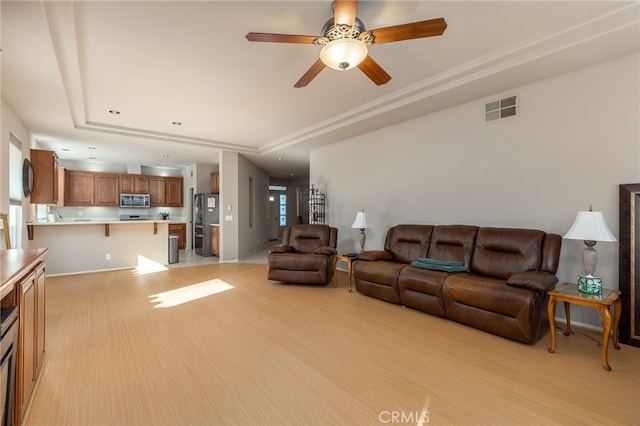 living room with ceiling fan