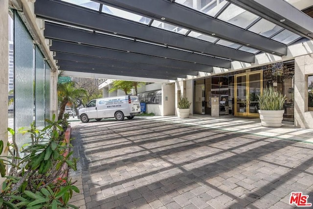 view of parking with a carport