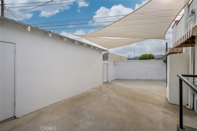 view of patio with fence