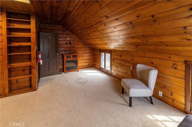 sitting room with light carpet, wooden walls, wood ceiling, and lofted ceiling