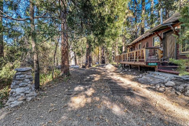 view of yard with a deck