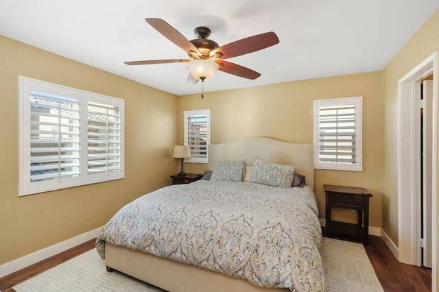 bedroom featuring ceiling fan and wood-type flooring