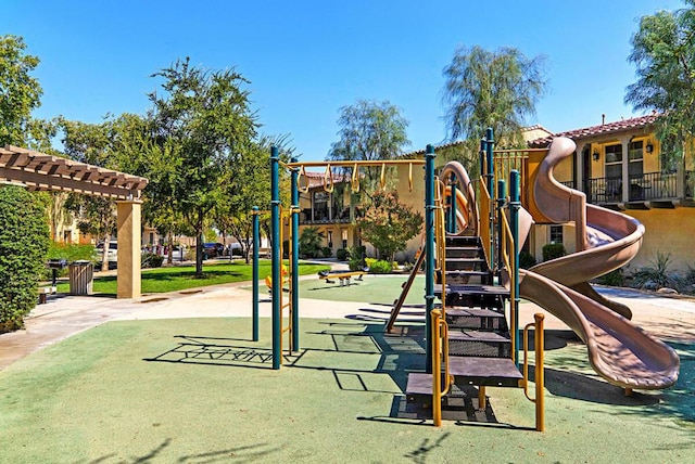 view of playground with a lawn