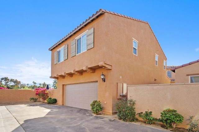 view of home's exterior with a garage