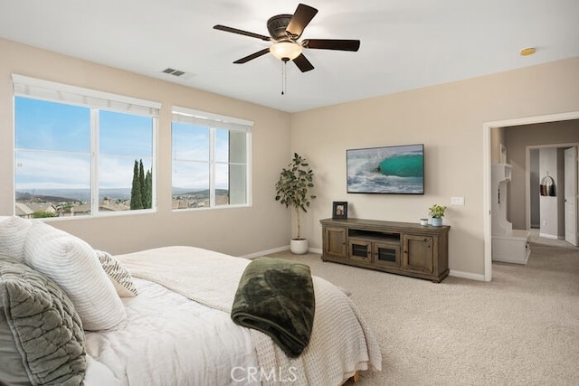 carpeted bedroom with ceiling fan