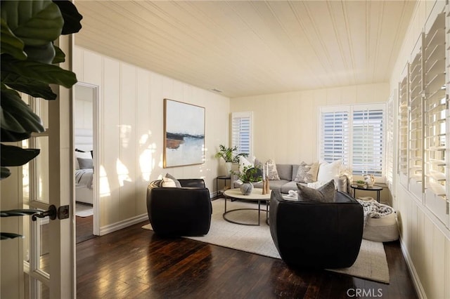 living room featuring dark hardwood / wood-style floors