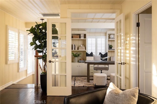 interior space featuring french doors, dark wood-type flooring, and wood ceiling