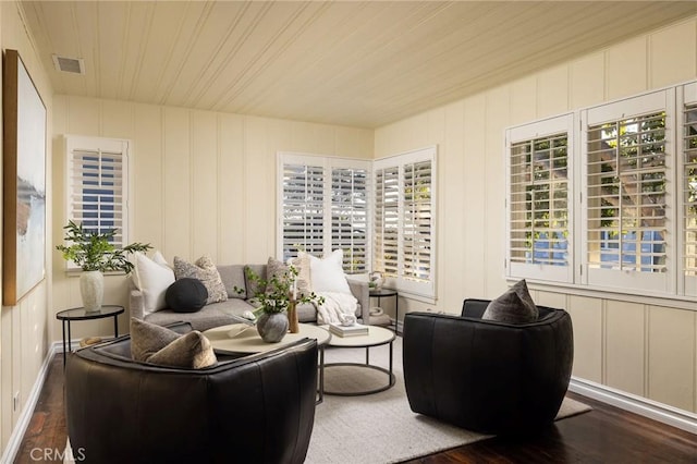 living room featuring dark wood-type flooring