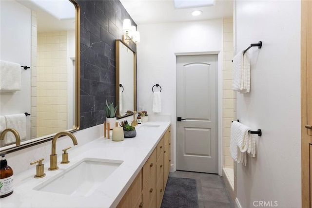 bathroom featuring backsplash and vanity