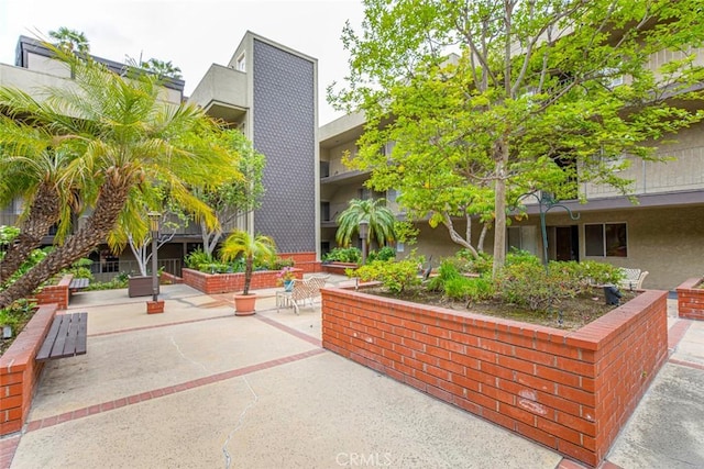 surrounding community with a patio