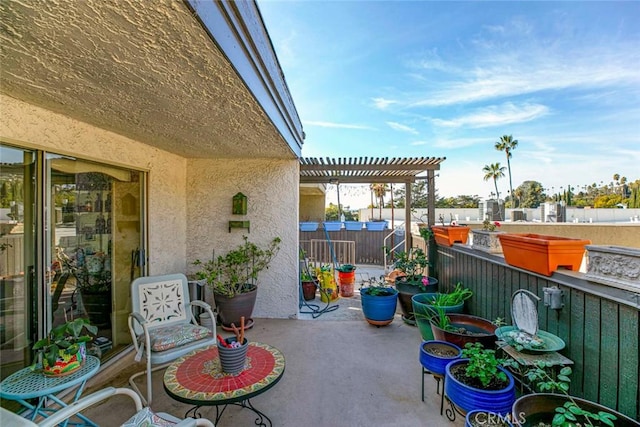 view of patio featuring a pergola