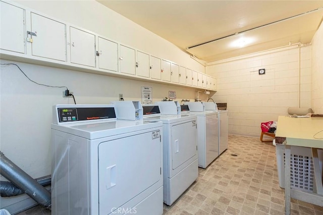 laundry room featuring washing machine and dryer