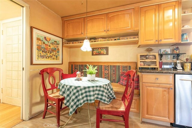 dining space with light wood-type flooring