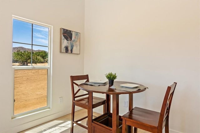 dining area with a mountain view