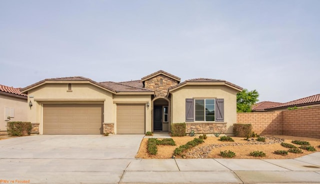 mediterranean / spanish-style house featuring a garage