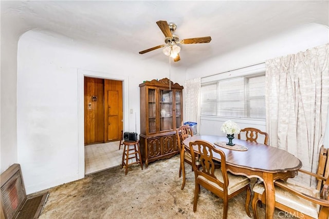 dining space featuring ceiling fan