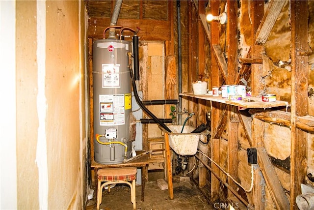 utility room featuring water heater