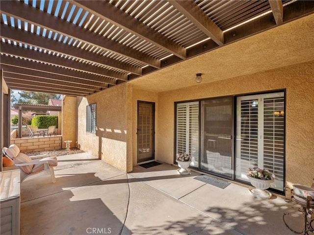 view of patio featuring a pergola