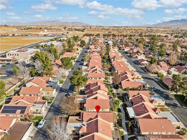 bird's eye view with a mountain view