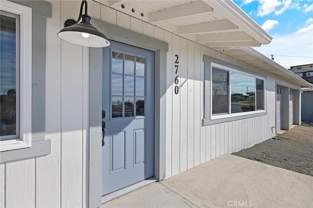 doorway to property featuring a patio