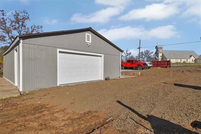 detached garage with driveway